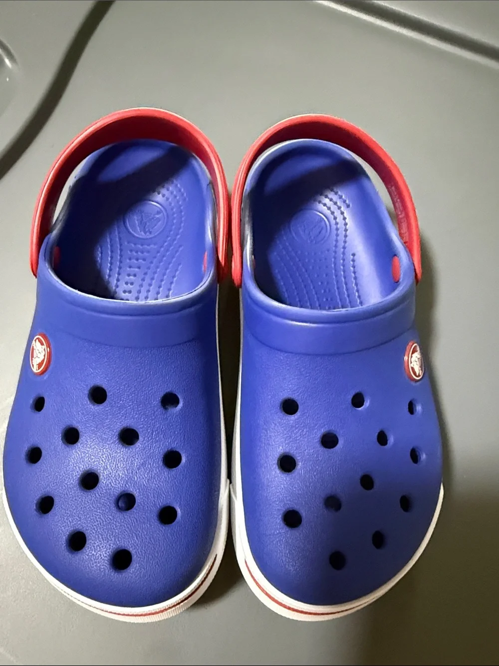 CROCS Kids Royal Blue Clogs with Red Heel Straps